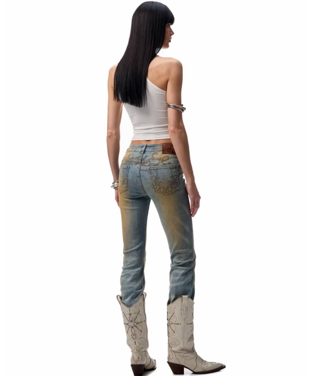 MUD-DYED WASHED DENIM FLARED PANTS