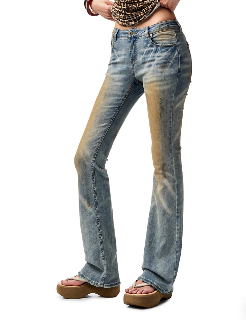 MUD-DYED WASHED DENIM FLARED PANTS