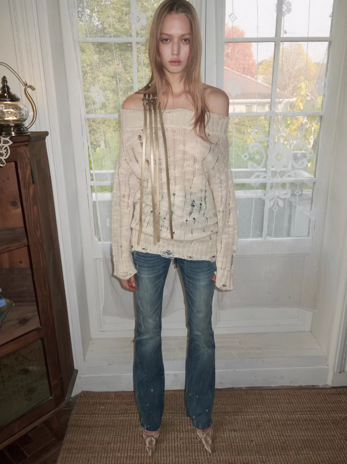 DISTRESSED KNIT STRAP SWEATER